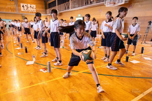 020725 - Picture shows the Welsh Rugby Team visiting Shinozaki Junior High School in Kitakyushu - 