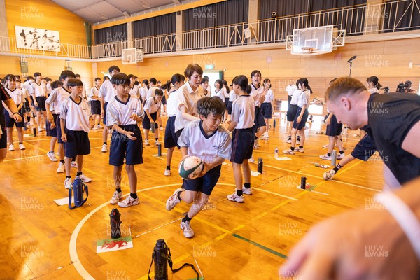 020725 - Picture shows the Welsh Rugby Team visiting Shinozaki Junior High School in Kitakyushu - 
