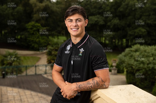 210823 - Wales Rugby World Cup Squad Announcement - Louis Rees-Zammit poses for a photo after a press conference