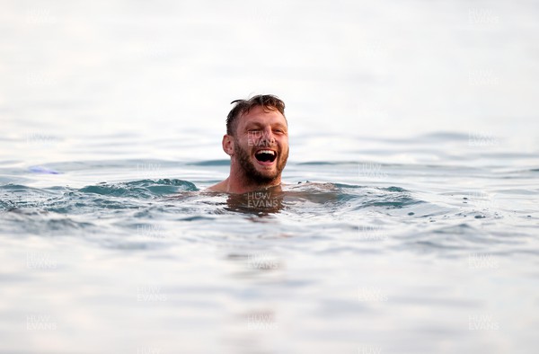 110923 - The Wales Rugby team start their time in Nice, South France with a sea recovery session - Dan Biggar