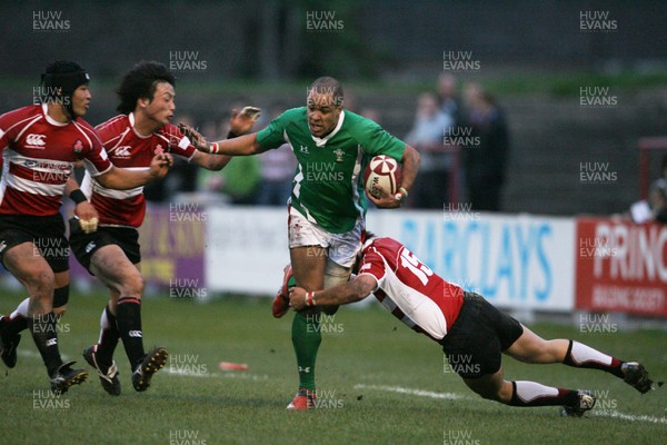01.04.09 Wales U20 Select v Japan U20... Wales' Jamie Davies is tackled by Shorei Takeshita. 