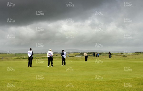 150613 - Speedy Services - Wales Senior Open - Royal Porthcawl Golf Club -    General view of the 15th Hole at the Royal Portcawl Golf Club as dark clouds gather in the sky  