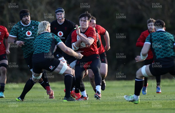 260124 - Wales Rugby Training against the U20s team - Harri Ackerman takes on Aaron Wainwright