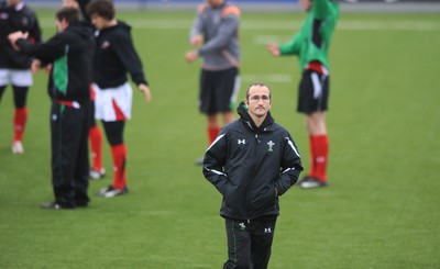 24.11.09 - Wales Sevens Rugby Training - Head coach Paul John looks on during training. 