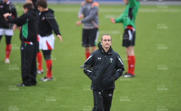 24.11.09 - Wales Sevens Rugby Training - Head coach Paul John looks on during training. 
