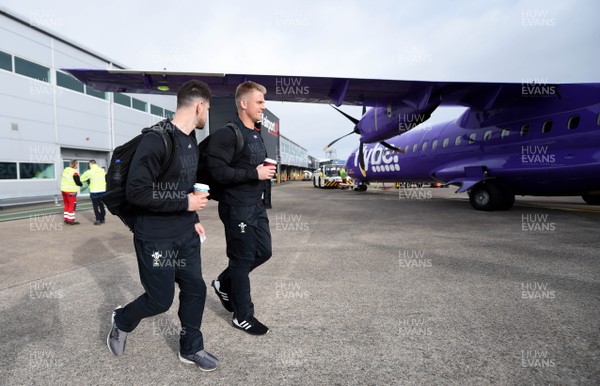 070319 - Wales Rugby Squad Travel to Edinburgh - Tomos Williams and Gareth Anscombe board the team flight to Edinburgh