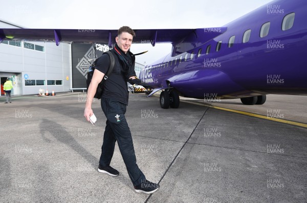 070319 - Wales Rugby Squad Travel to Edinburgh - Josh Adams boards the team flight to Edinburgh