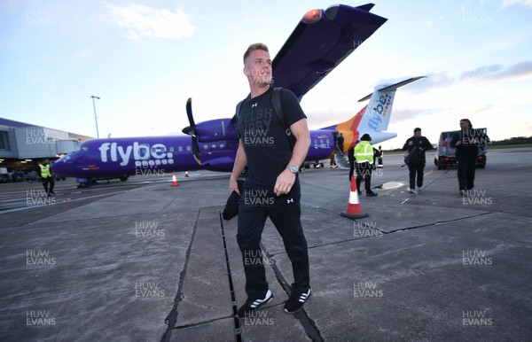 070319 - Wales Rugby Squad Travel to Edinburgh - Gareth Anscombe arrives in Edinburgh