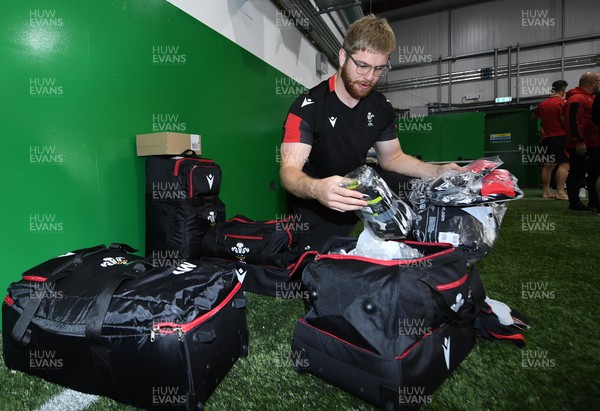 181021 - Wales Rugby Squad First Day of Camp - Aaron Wainwright looks through his kit bag during the Wales squads first day of camp