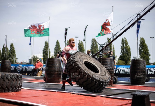 170722 - Picture shows Luke Sperduti competing in the sunshine at this years Wales� Strongest Women competition as the country contends with an extreme red weather warning heatwave