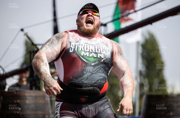 170722 - Picture shows Garret Cann competing in the sunshine at this years Wales� Strongest Women competition as the country contends with an extreme red weather warning heatwave