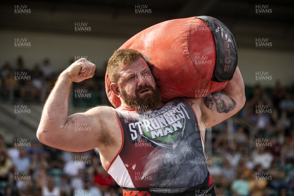 170722 - Picture shows David Ramplee competing in the sunshine at this years Wales� Strongest Women competition as the country contends with an extreme red weather warning heatwave
