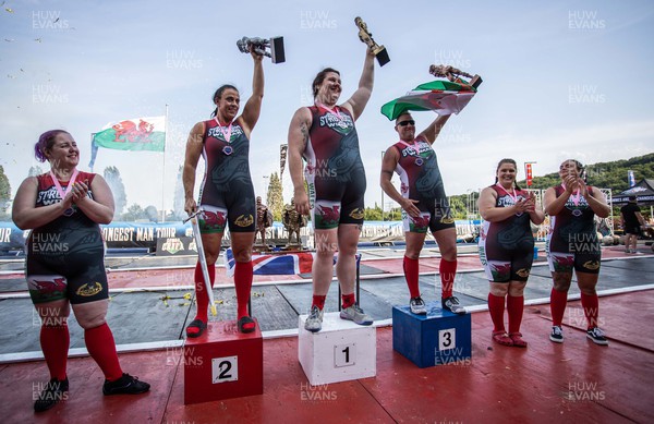 170722 - Picture shows top 3 Sam Taylor (3rd), Claire Myler (2nd) and Rebecca Roberts (1st) competing in the sunshine at this years Wales� Strongest Women competition as the country contends with an extreme red weather warning heatwave