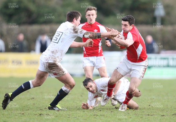 170313 - Wales Students v England Students, Clifton RFC - Wales' Steffan Jones holds off England's Alex Dancer