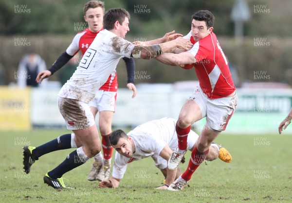 170313 - Wales Students v England Students, Clifton RFC - Wales' Steffan Jones holds off England's Alex Dancer