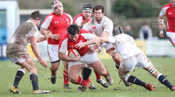 170313 - Wales Students v England Students, Clifton RFC - Wales' Brynley Toms is brought down by the English defence