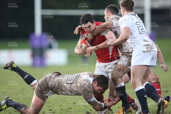 170313 - Wales Students v England Students, Clifton RFC - Wales' Steffan Jones is tackle by England's Alex Dancer and England's Sam Katz