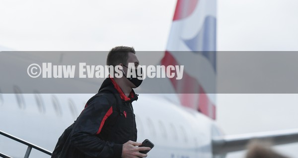 030222 - Wales Rugby team arrive in Dublin - Liam Williams leaves the plane as the Wales team arrive in Ireland ahead of this weekend opening Six Nations match