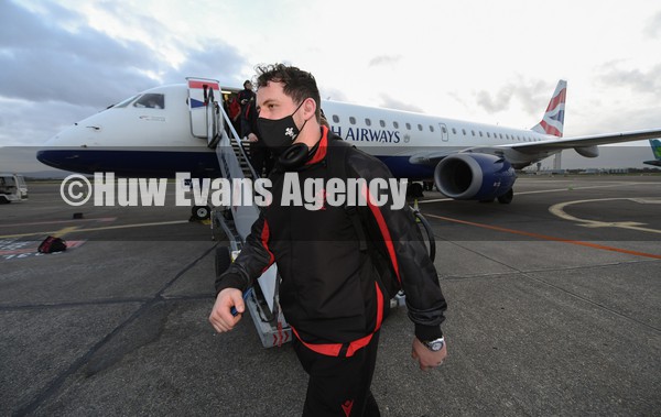 030222 - Wales Rugby team arrive in Dublin - Ryan Elias leaves the plane as the Wales team arrive in Ireland ahead of this weekend opening Six Nations match