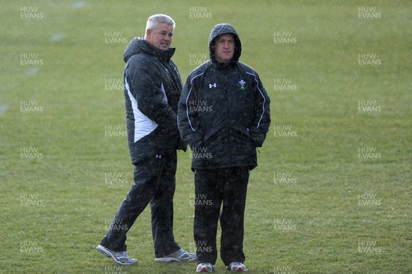 01.02.10 - Wales Rugby Training - Wales head coach Warren Gatland(L) and defence coach Shaun Edwards look on during training. 