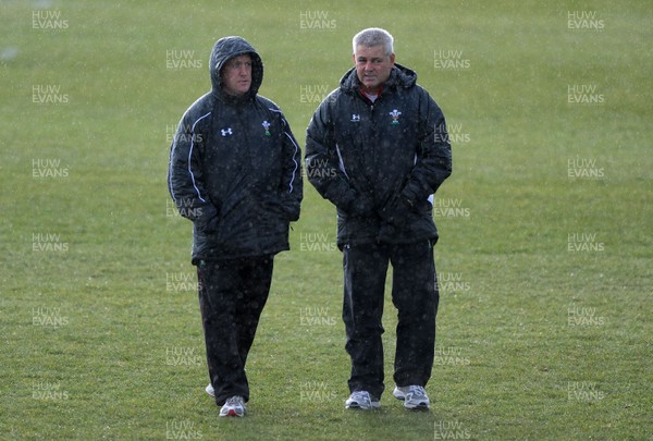 01.02.10 - Wales Rugby Training - Wales head coach Warren Gatland(r) and defence coach Shaun Edwards look on during training. 