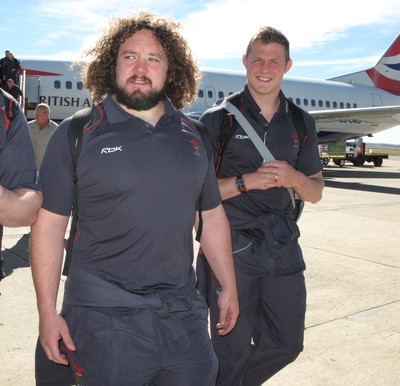 06.06.08 Wales rugby in S.Africa... Wales Adam Jones(lt) and Dafydd Jones arrive at Bloemfontein Airport.   