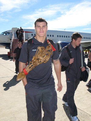06.06.08 Wales rugby in S.Africa... Wales Tom James arrives at Bloemfontein Airport carrying the traditional Welsh Lovespoon.   