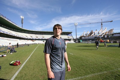 06.06.08 Wales rugby in S.Africa... Wales Ryan Jones surveys the venue  during the Captains Run at  the stadium in Bloemfontein which is still being renovated.   