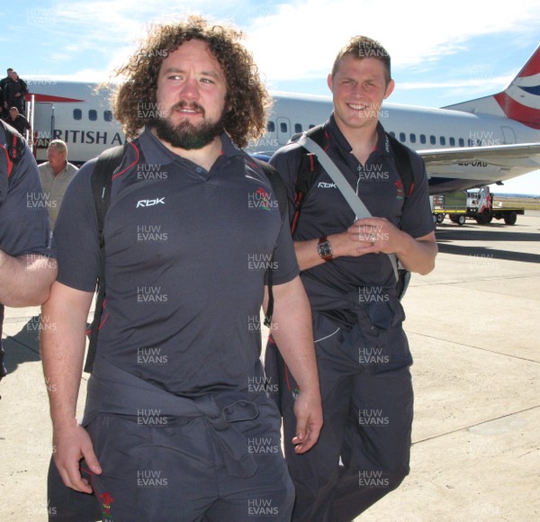 06.06.08 Wales rugby in S.Africa... Wales Adam Jones(lt) and Dafydd Jones arrive at Bloemfontein Airport.   