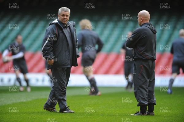 11.03.08 - Wales Rugby Training - Wales Coach, Warren Gatland and Defence coach, Shaun Edwards(R) look on during training 