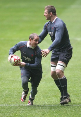 14.02.08 - Wales Rugby Training - Shane Williams is caught by Ian Gough(R) during training 