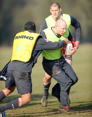 19.02.08  - Wales Rugby Training - Tom Shanklin is tackled by Tom James during training 