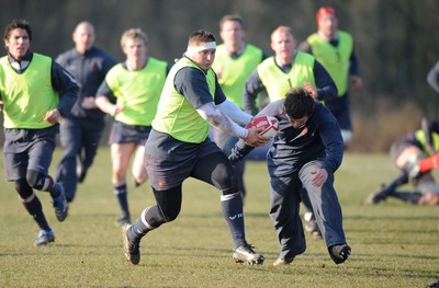 19.02.08  - Wales Rugby Training - Rhys Thomas goes on the charge during training 