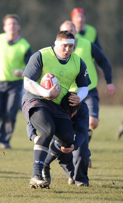 19.02.08  - Wales Rugby Training - Rhys Thomas goes on the charge during training 