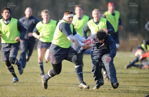19.02.08  - Wales Rugby Training - Rhys Thomas goes on the charge during training 
