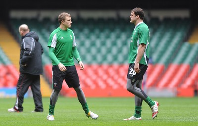 19.03.10 - Wales Rugby Training - Tom Prydie talks to Jamie Roberts during training. 