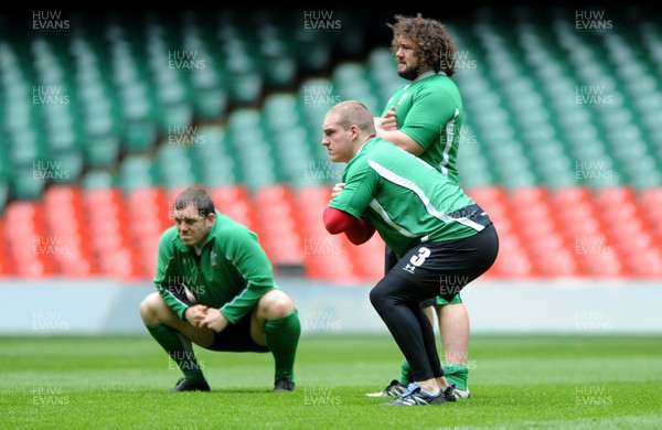 19.03.10 - Wales Rugby Training - Paul James, Gethin Jenkins and Adam Jones warm up during training. 