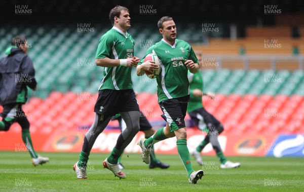 19.03.10 - Wales Rugby Training - Lee Byrne is supported by Jamie Roberts during training. 