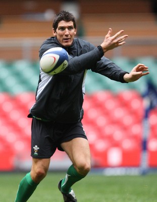 25.02.09 - Wales Rugby Training -  James Hook feeds the ball out 