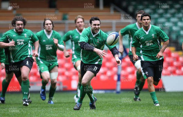 25.02.09 - Wales Rugby Training -  Stephen Jones releases the ball during training 