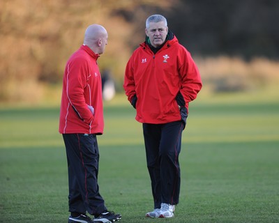 25.11.08 - Wales Rugby Training - Wales Coaches Shaun Edwards and Warren Gatland look on during training 
