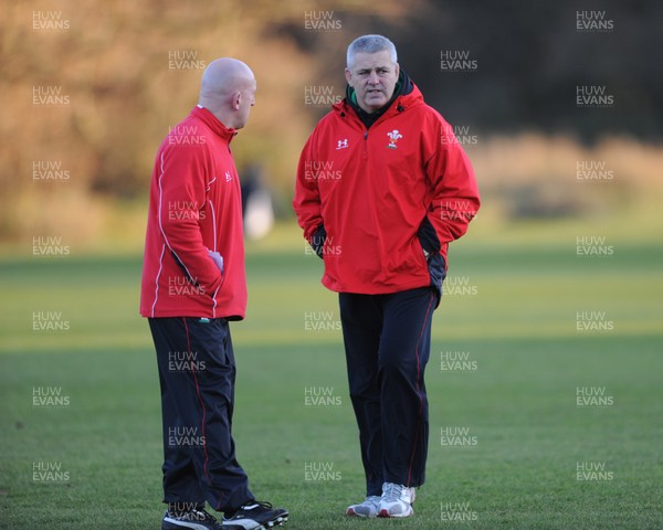 25.11.08 - Wales Rugby Training - Wales Coaches Shaun Edwards and Warren Gatland look on during training 