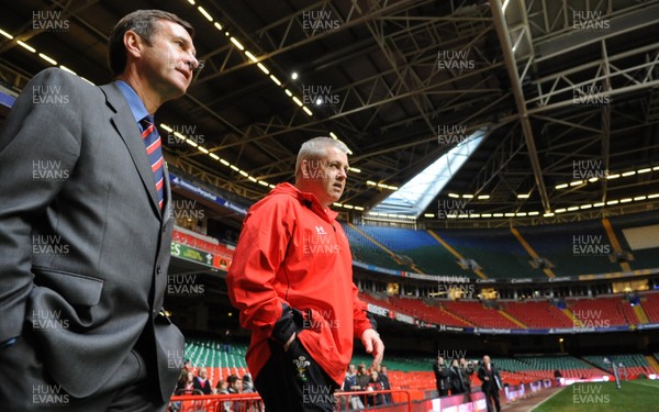 28.11.08 - Wales Rugby Training - WRU Chief Executive, Roger Lewis and Wales Coach, Warren Gatland walk out onto the pitch at the Millennium Stadium. 