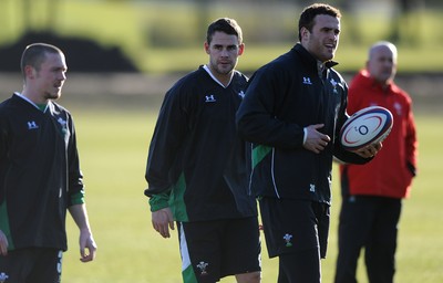 29.01.10 - Wales Rugby Training - Lee Byrne looks on during training. 