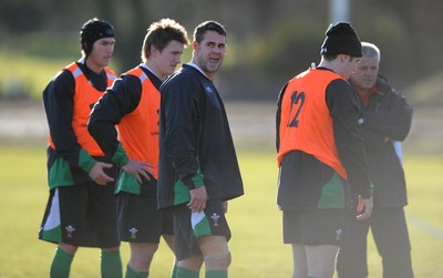 29.01.10 - Wales Rugby Training - Lee Byrne looks on during training. 