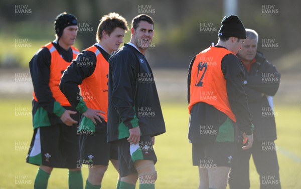 29.01.10 - Wales Rugby Training - Lee Byrne looks on during training. 