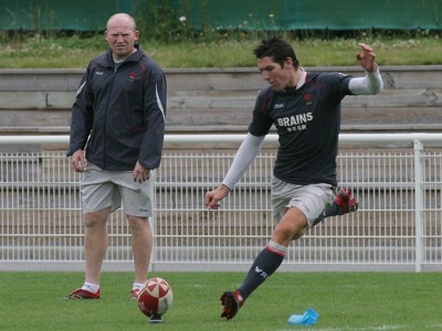 23.07.07 Wales World Cup Squad Training, St. Nazaire, France James Hook puts in some kicking practise under the watchful eye of coach Neil Jenkins. Darren Griffiths/