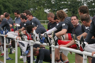 23.07.07 Wales World Cup Squad Training, St. Nazaire, France Players stretch out during warm-up sessions at the Welsh team training camp in St.  Nazaire, France Darren Griffiths/