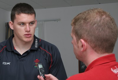 23.07.07 Wales World Cup Squad Training, St. Nazaire, France Ian Evans talks with Delme Parfitt during a press conference  at the Wales training camp in St. Nazaire, France. Darren Griffiths/