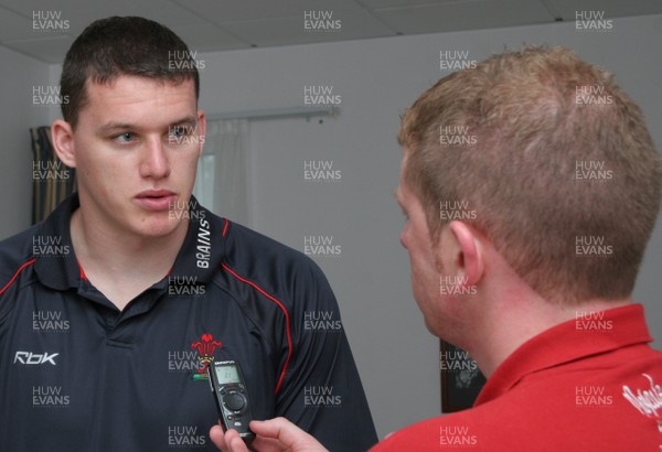 23.07.07 Wales World Cup Squad Training, St. Nazaire, France Ian Evans talks with Delme Parfitt during a press conference  at the Wales training camp in St. Nazaire, France. Darren Griffiths/